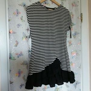 Cute striped mini dress of tonic. Ruffles